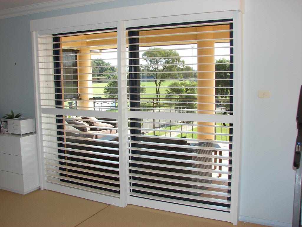 Traditional And Convenient Bi Pass Shutters The Shutter Guy